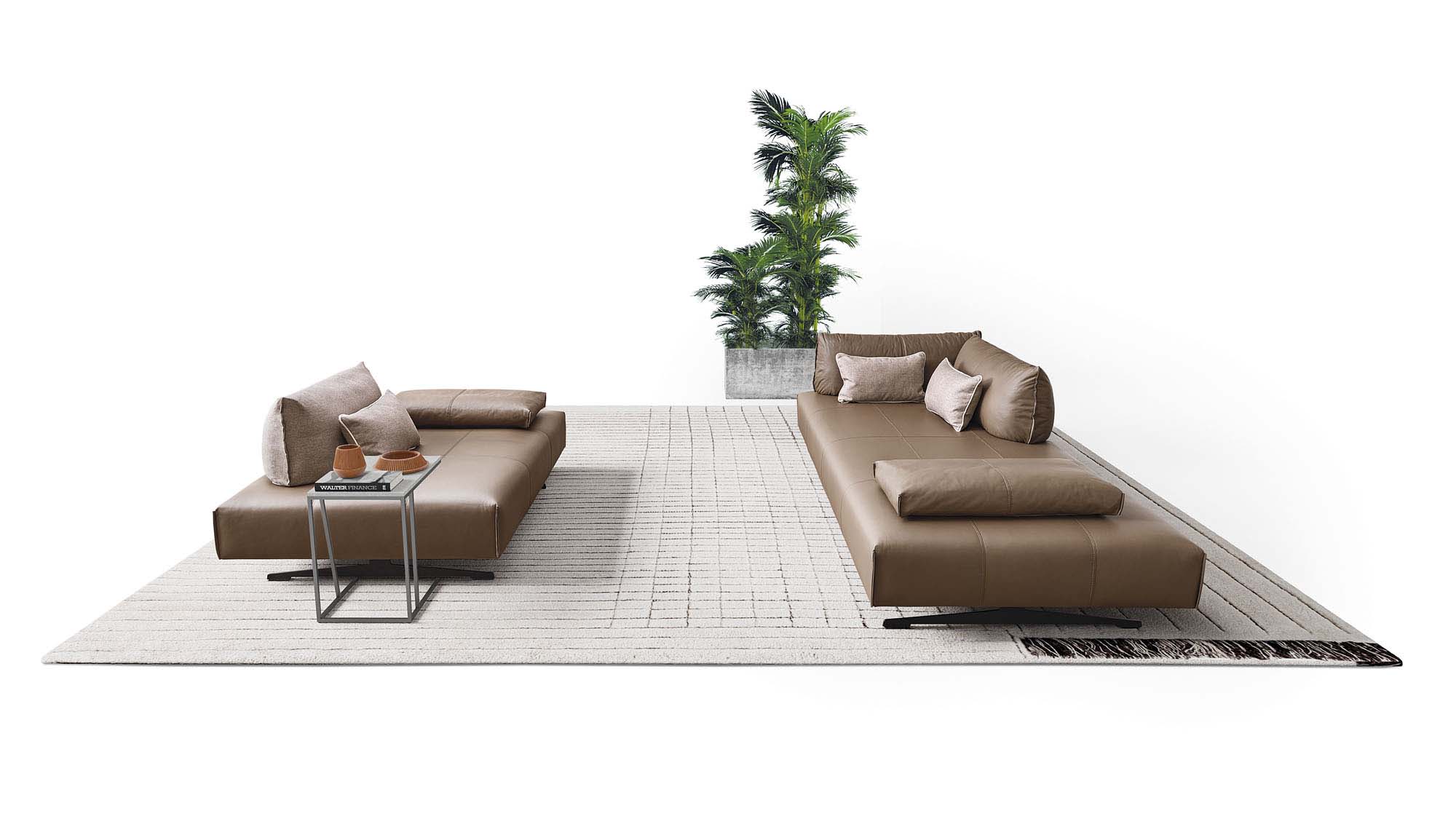 Divano modulare in pelle marrone configurato a due isole separate