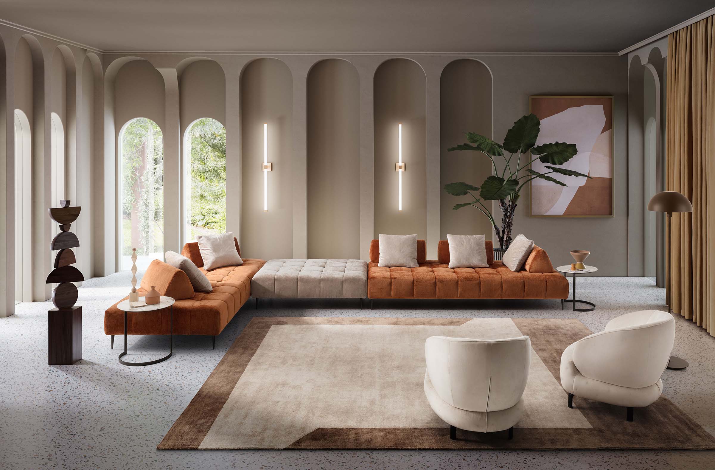 Soggiorno moderno arredato con divano Bowie ampio e di design e due poltroncine bianche