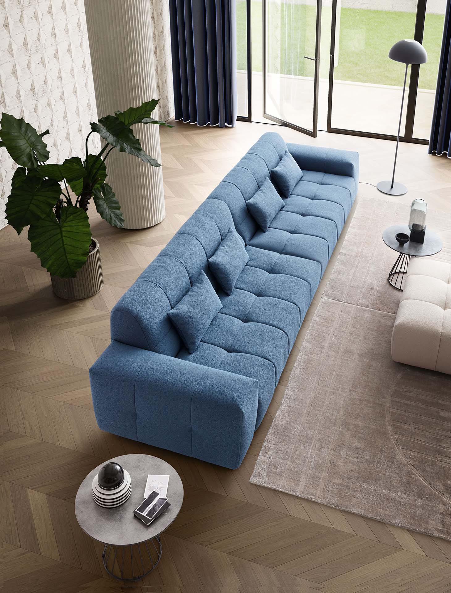 Divano lineare con rivestimento trapuntato morbido di colore azzurro Dandy 024. Soggiorno moderno e raffinato.