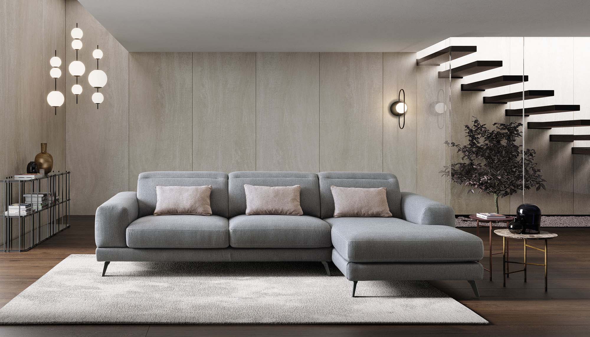 Soggiorno moderno arredato con divano grigio di design con poggiatesta regolabili
