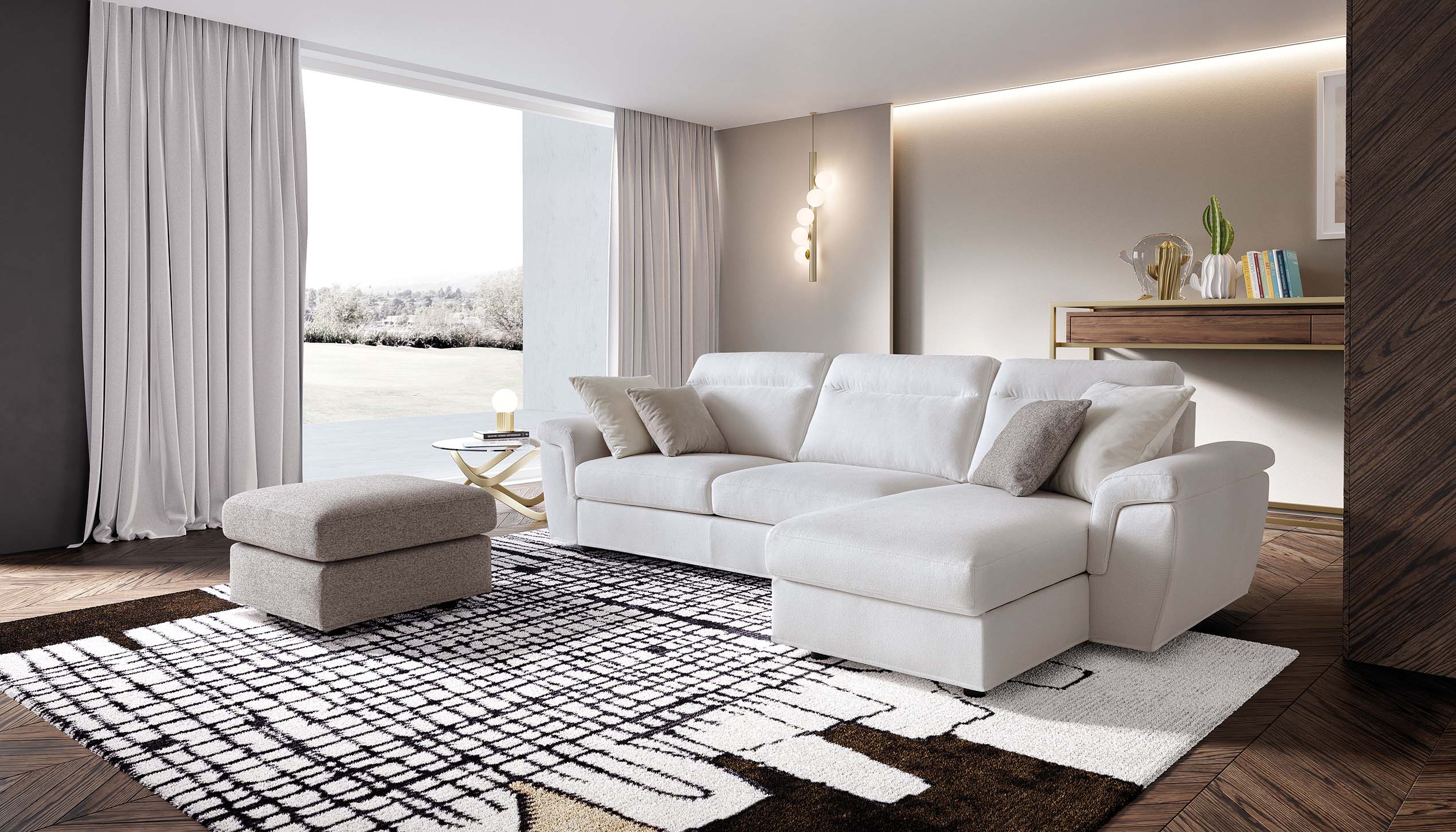 Salotto moderno composto da divano Kallima bianco a penisola con pouf grigio.
