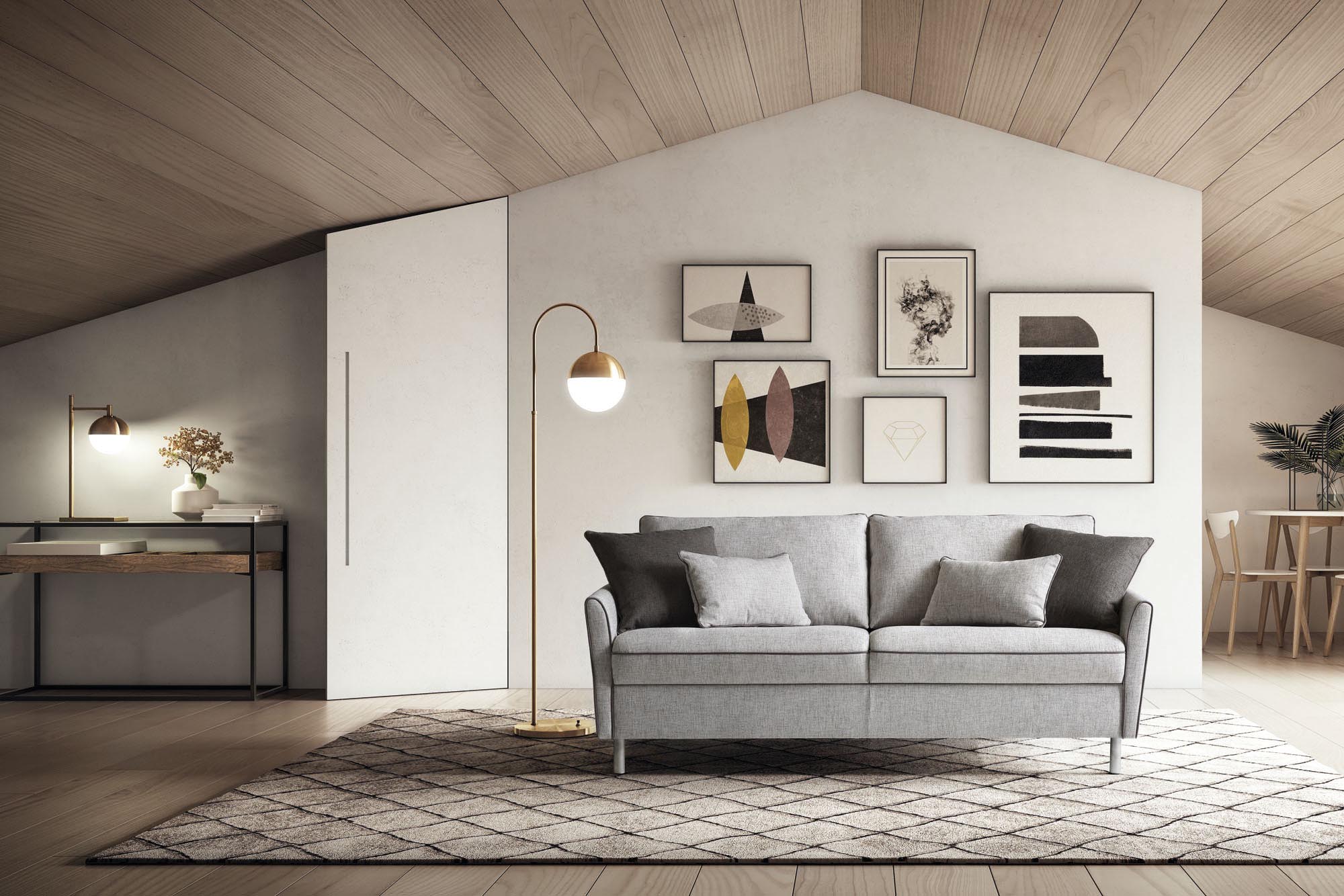 Divano letto Bali in un salottino mansardato dallo stile classico