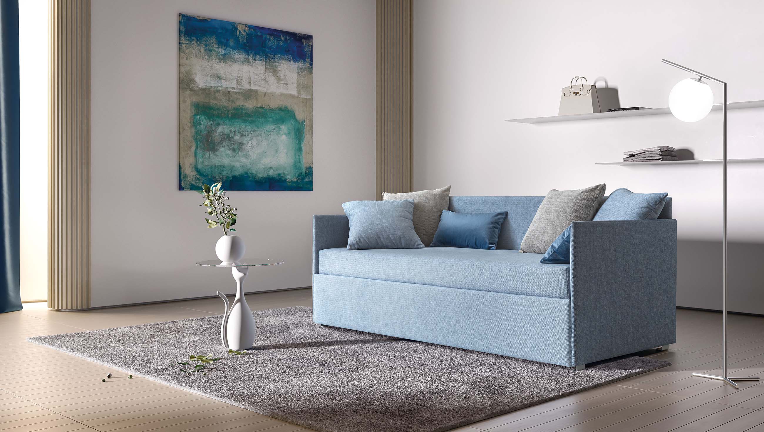 Divano colore azzurro con schienale su tre lati e che può fungere anche da lettino singolo comodo. Struttura salvaspazio molto sottile.