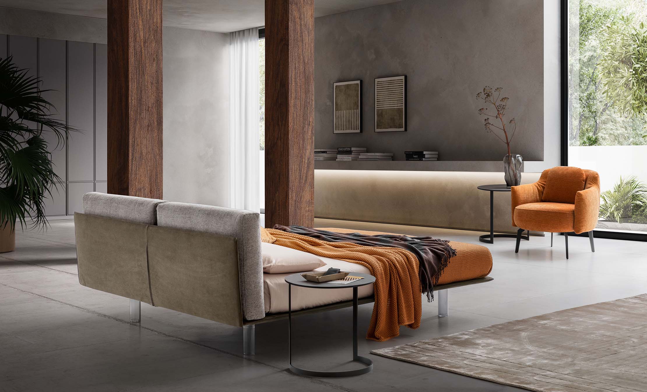 Stanza di design arredata con letto matrimoniale di design Essential con piedini trasparenti alti.