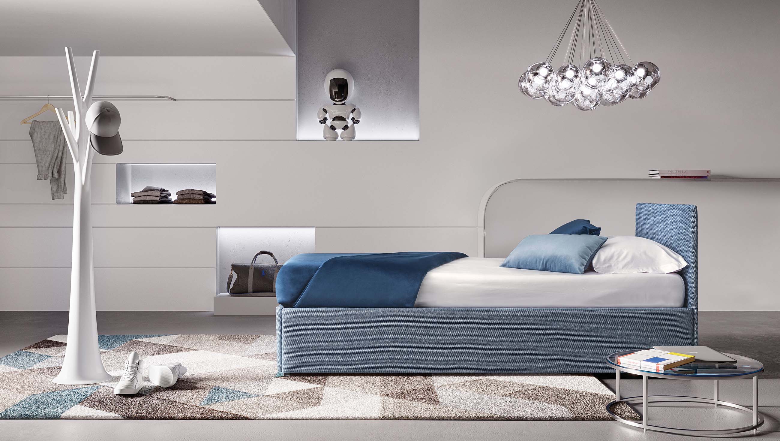 Daybed con testiera leggermente imbottita ma senza pediera. Versione in tessuto colore blu-azzurro